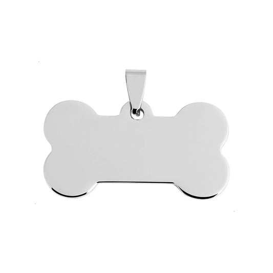 Silver bone-shaped pendant on a white background