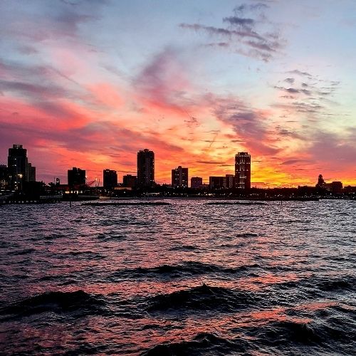 City of St. Petersburg skyline at sunset with vibrant colors in the sky