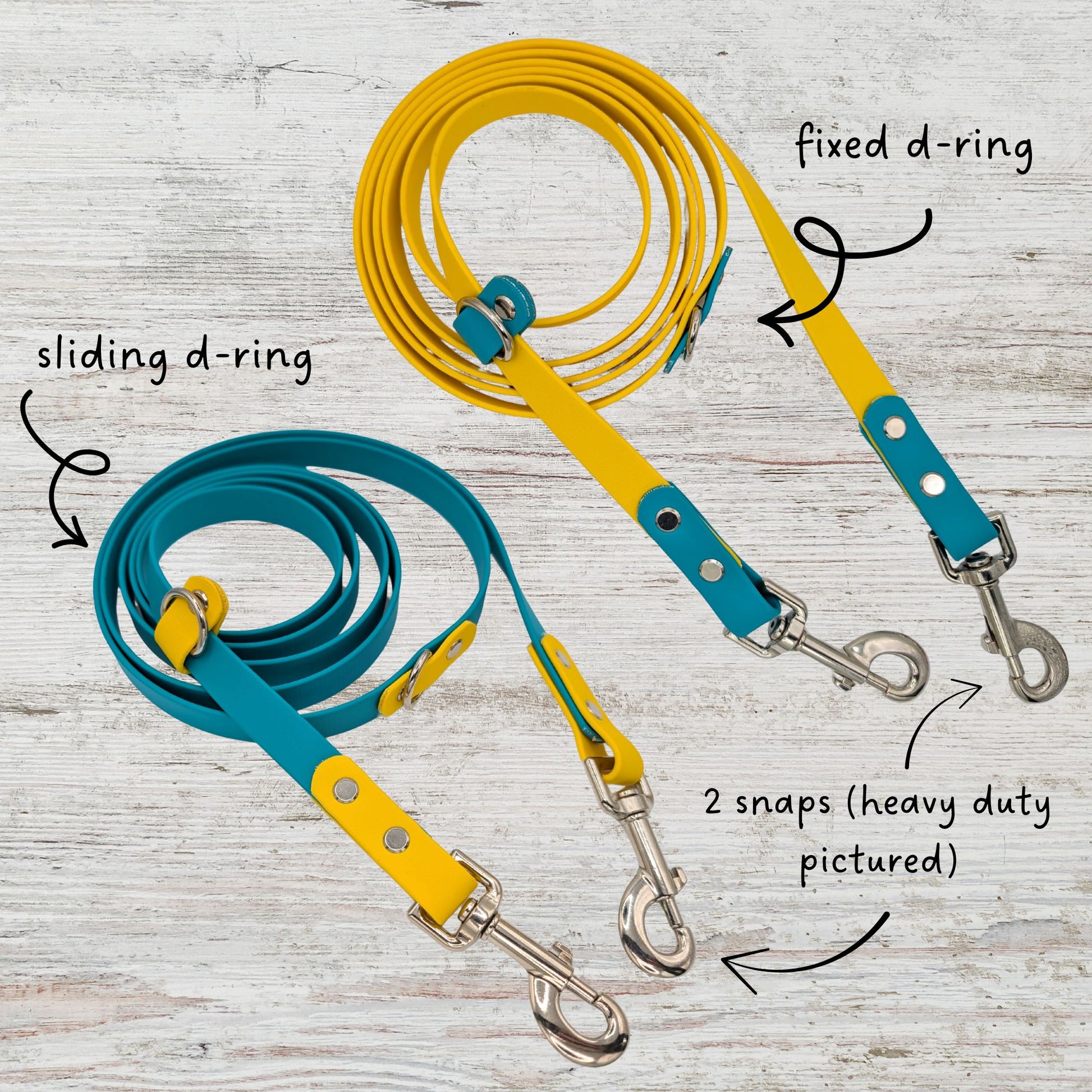 Two multifunction dog leashes, one teal and one yellow, on a light gray background.